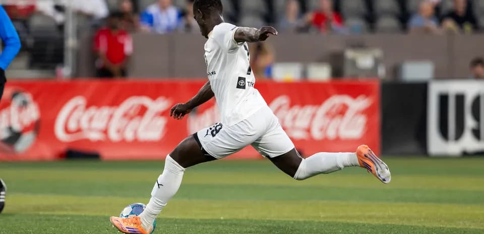 Player in white kit during USL Championship match