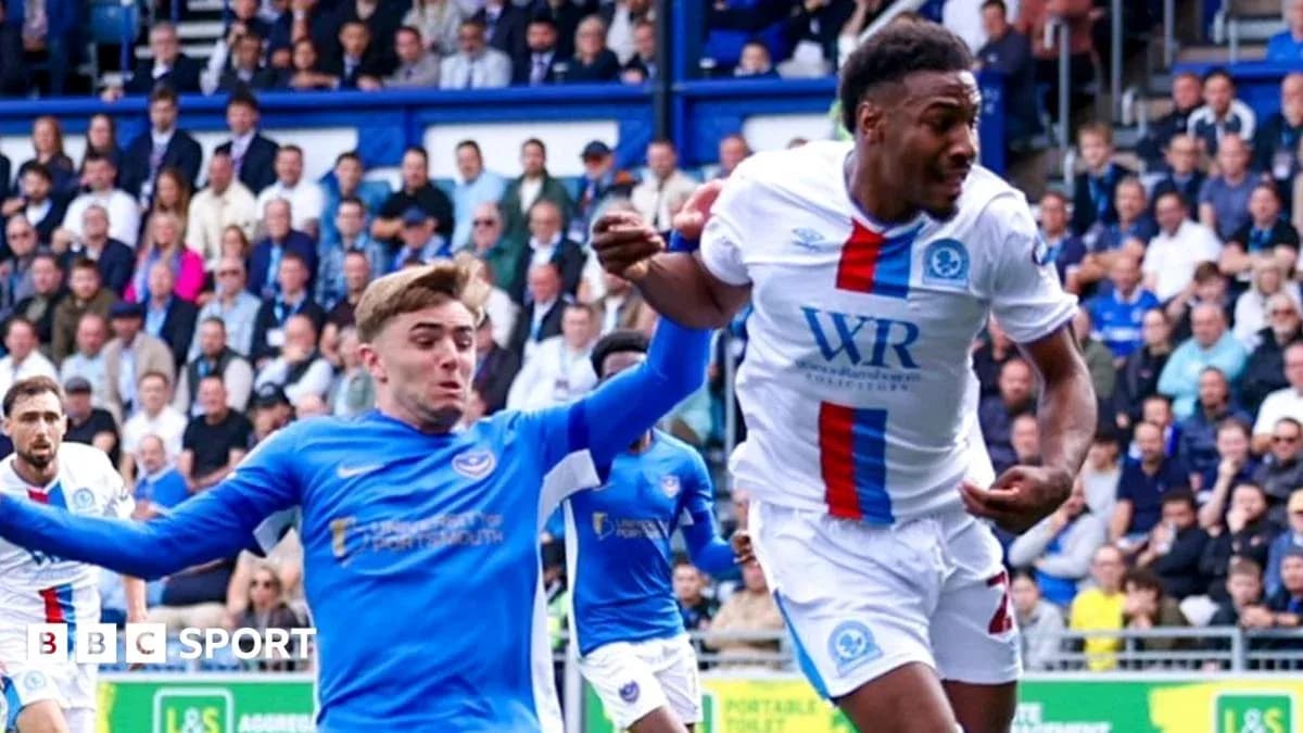 Two players contesting the ball during a match