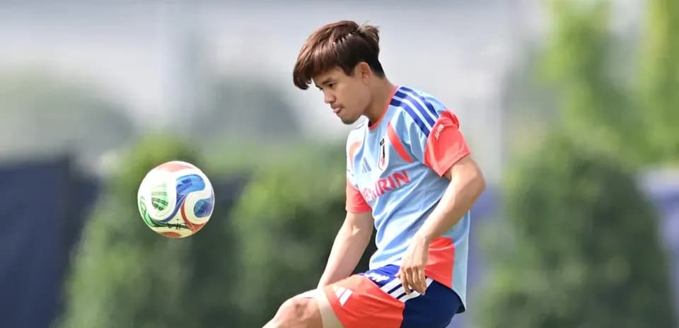 Player kicking a soccer ball during training session