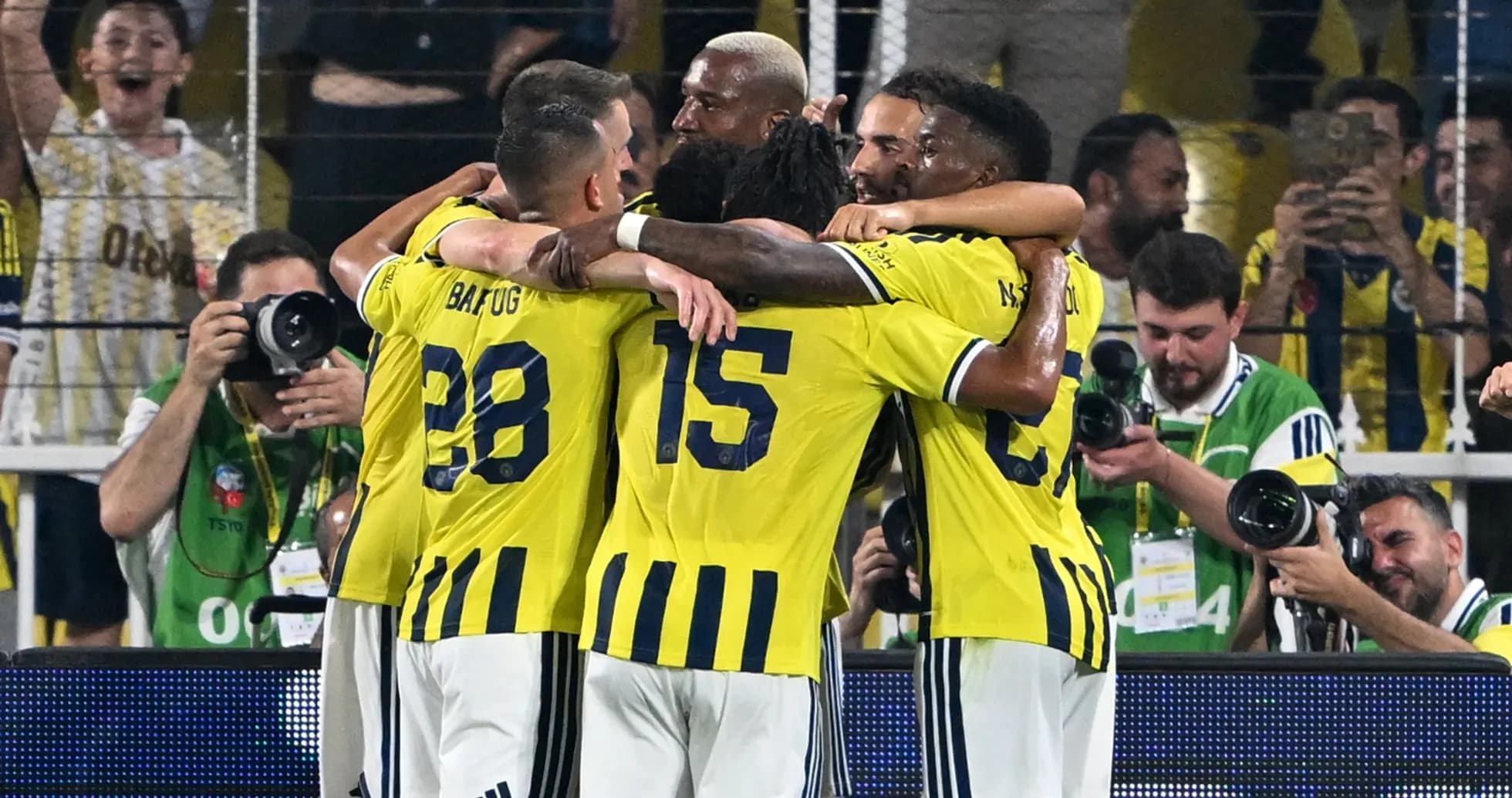 Fenerbahçe players celebrating a goal together