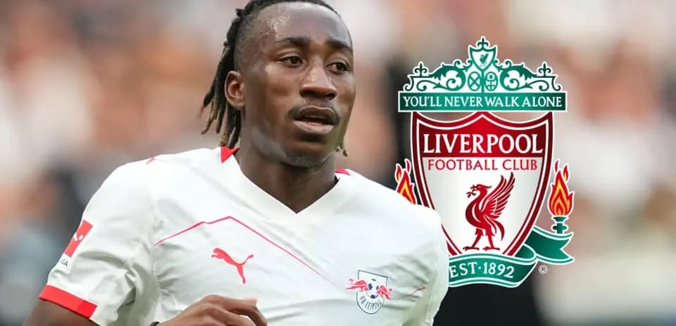 Player running with ball alongside Liverpool FC logo