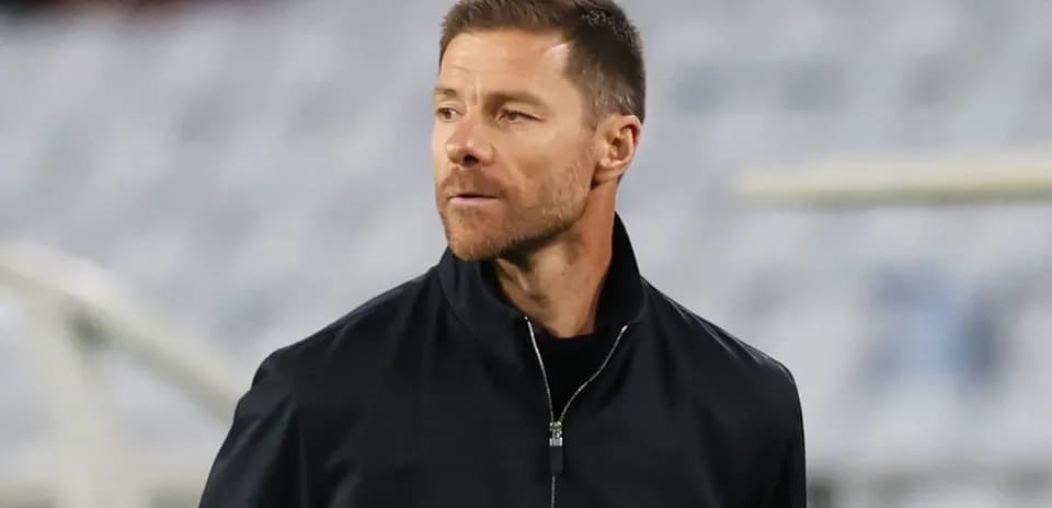 Coach observing the match from the sideline