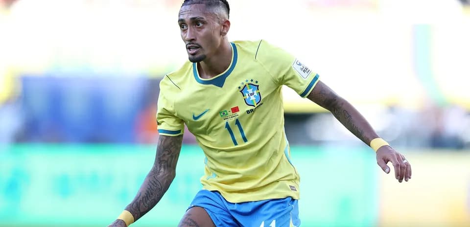 Player in Brazil jersey running on the field