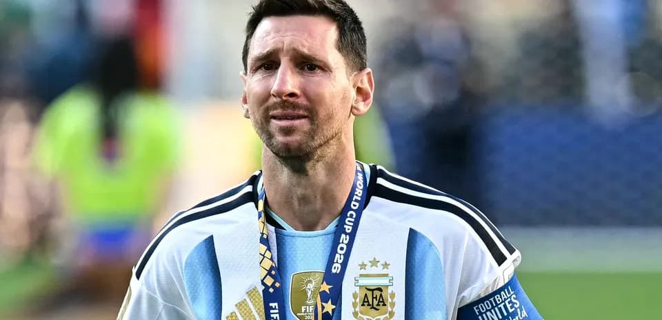 Player with medal walking after World Cup match