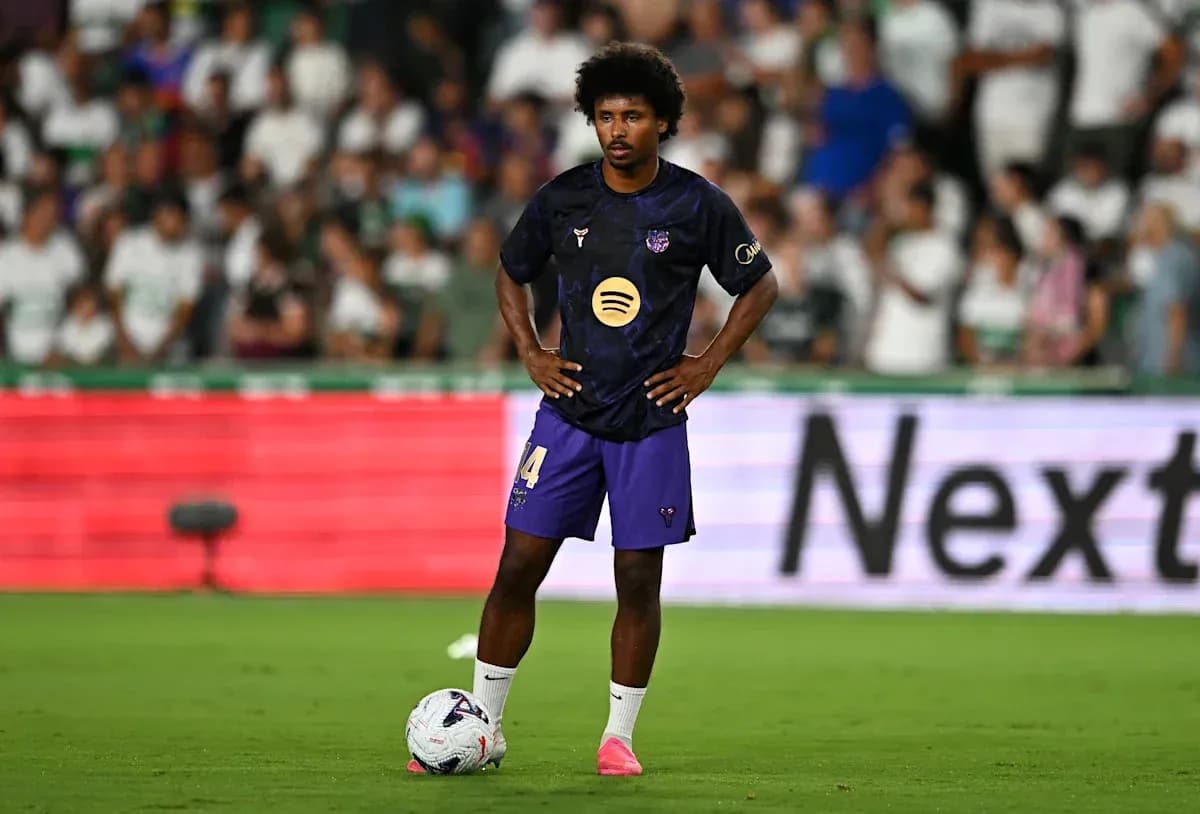 Player preparing for a free kick on the field