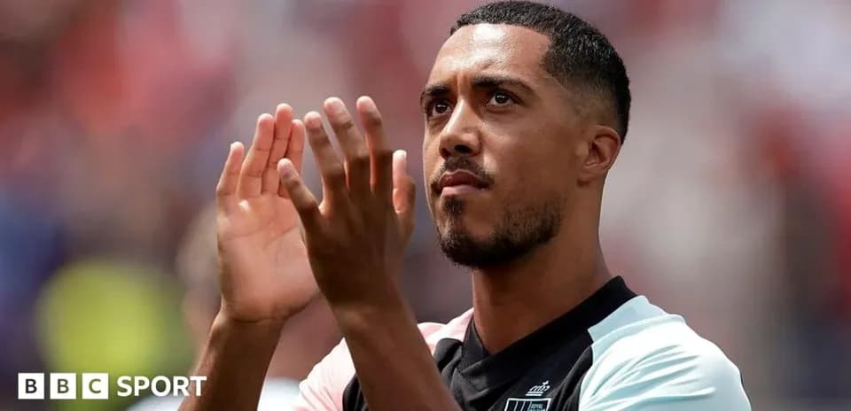 Player applauding fans after the match