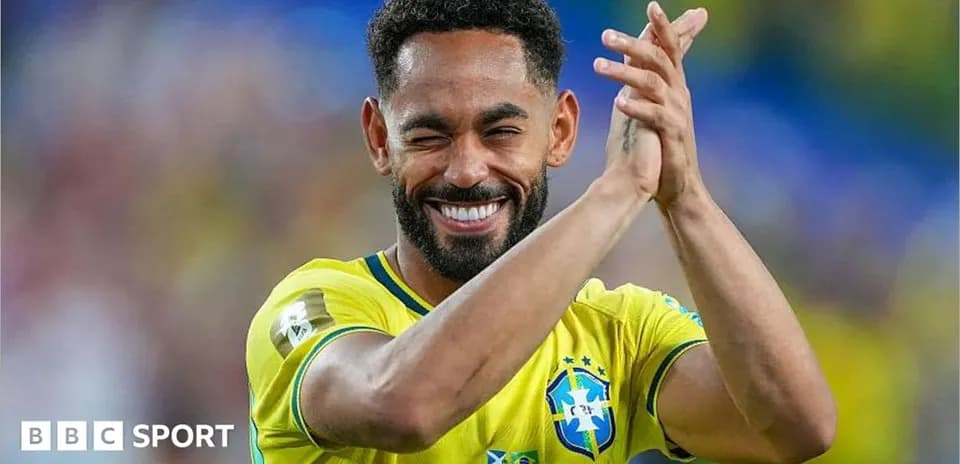 Brazilian player celebrating and applauding fans