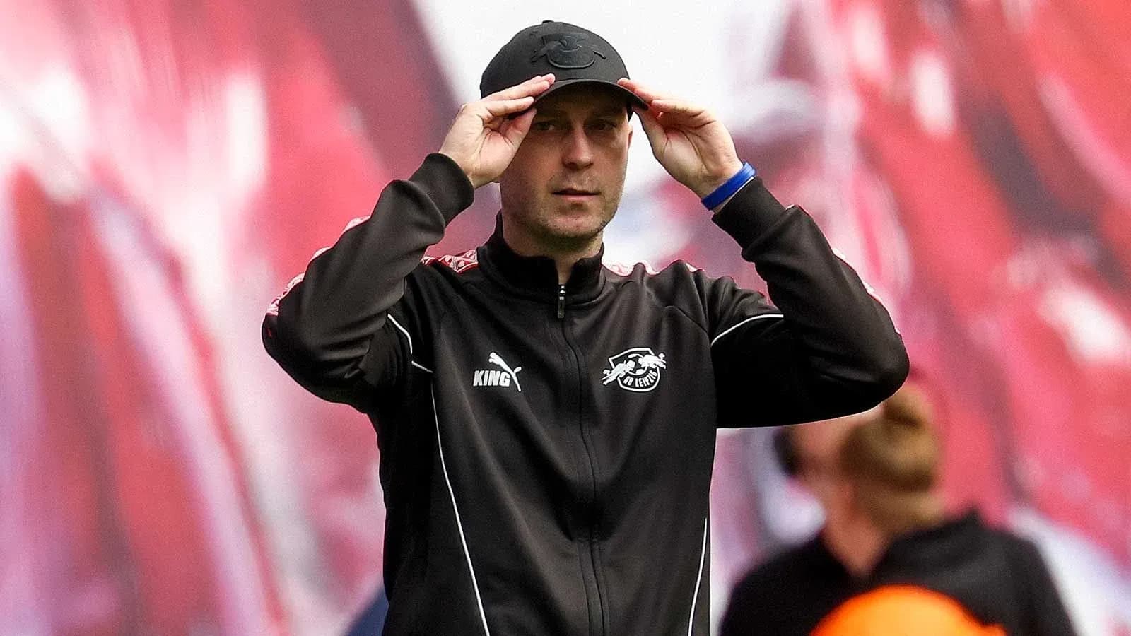 Coach adjusting cap during match on the sideline