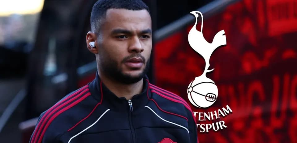 Player arriving at stadium wearing club tracksuit