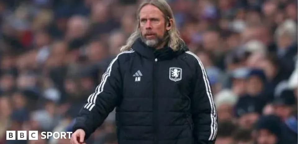 Manager directing players during a match