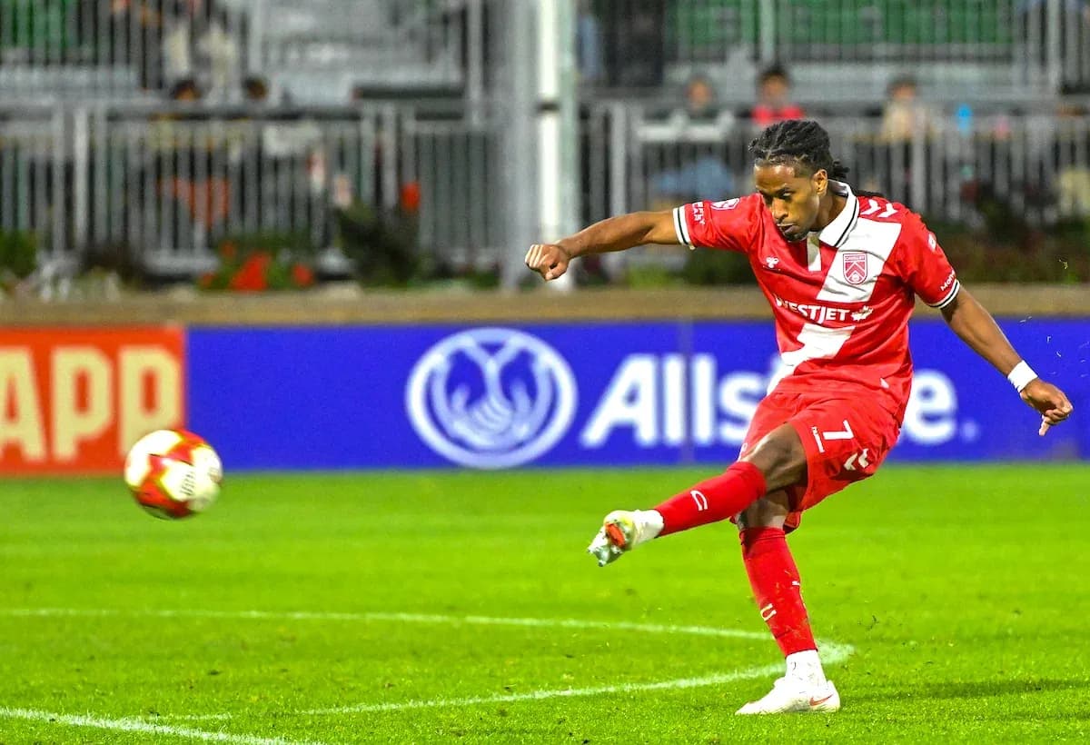 Player taking a shot during Cavalry FC match
