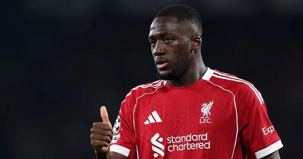Player giving thumbs up in Liverpool jersey