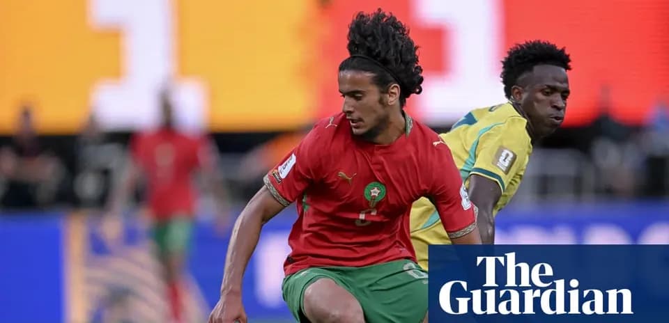 Moroccan player dribbling past opponent during match