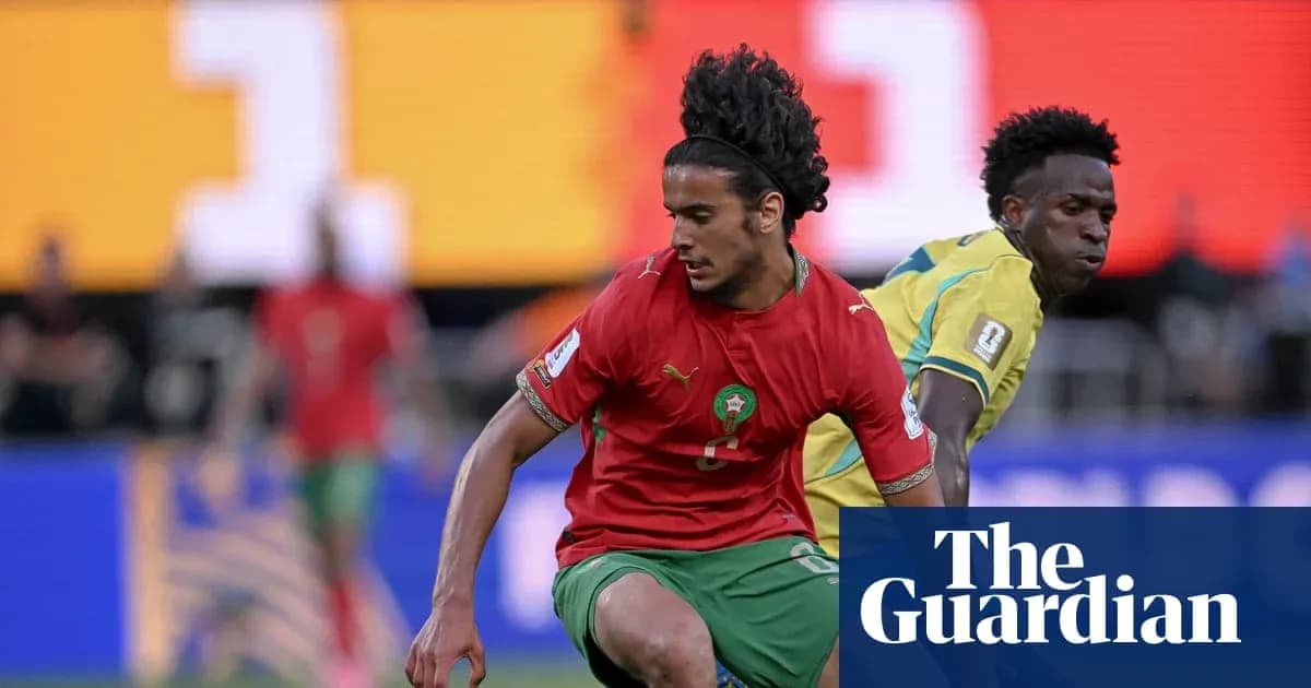 Moroccan player dribbling past opponent during match
