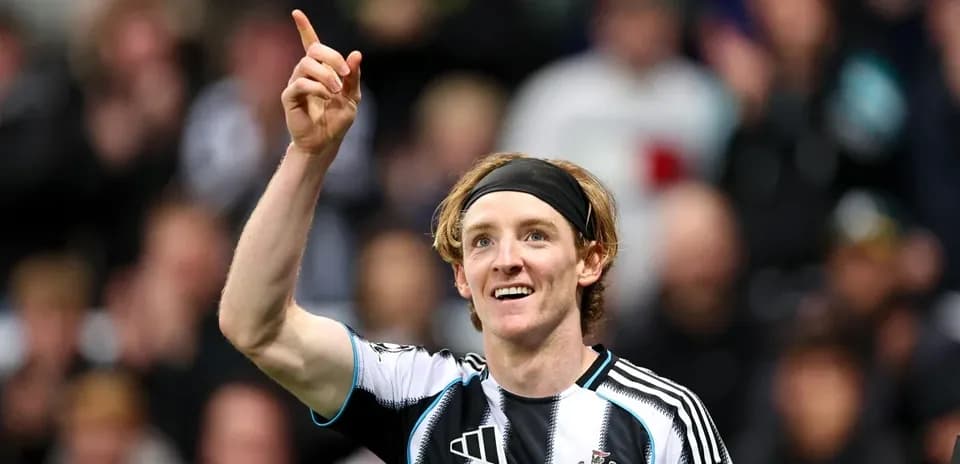Player celebrating with raised finger at stadium