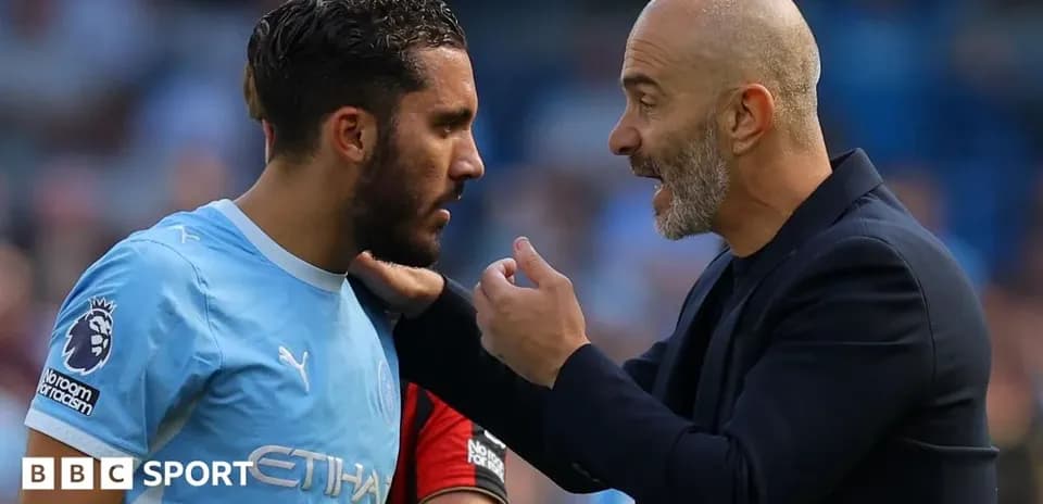 Player and coach discussing strategy during match