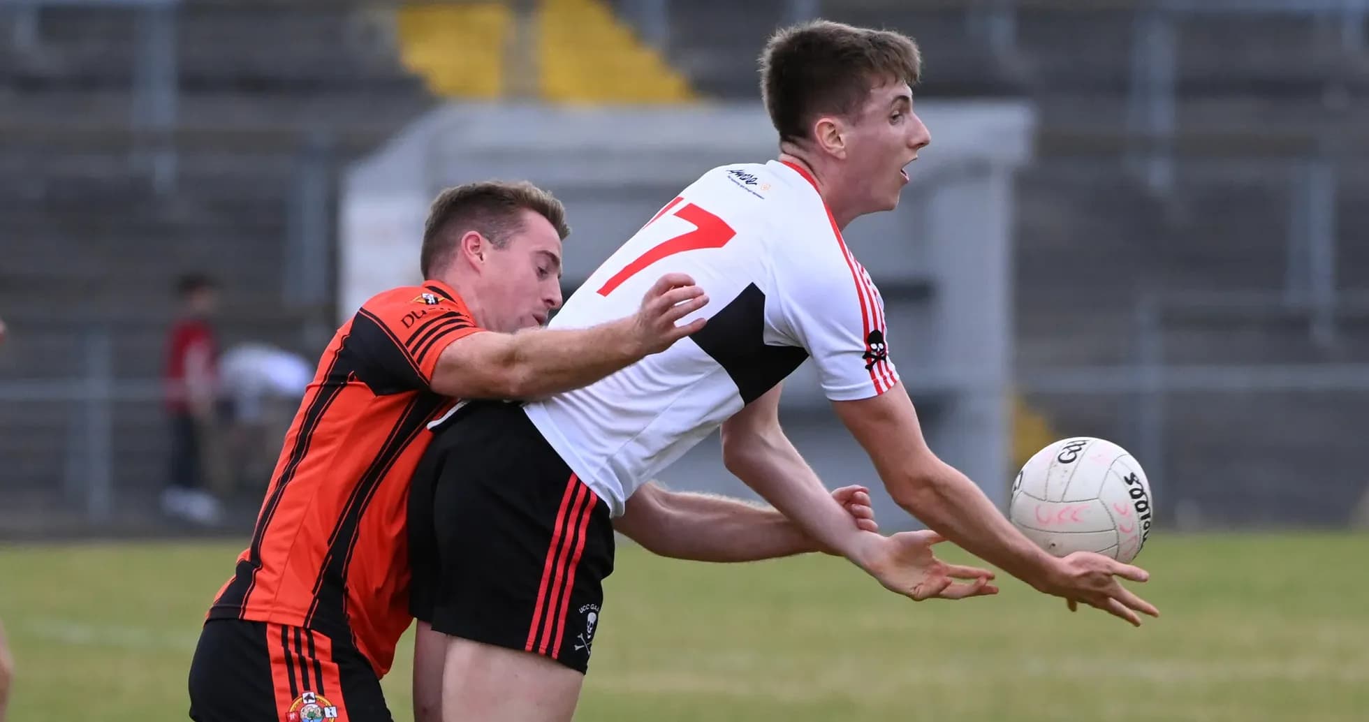 Two players contesting for the ball during match