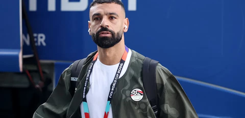 Player arriving with headphones before match