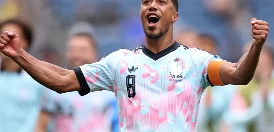 Belgian player celebrating victory in match