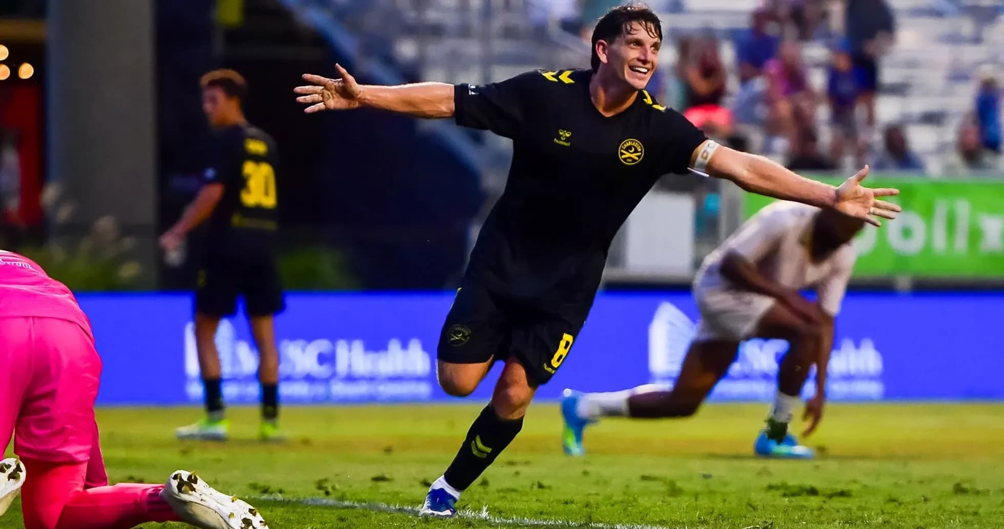 Player celebrating after scoring a goal