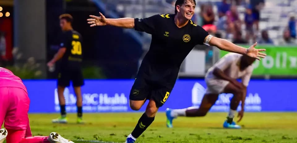 Player celebrating after scoring a goal