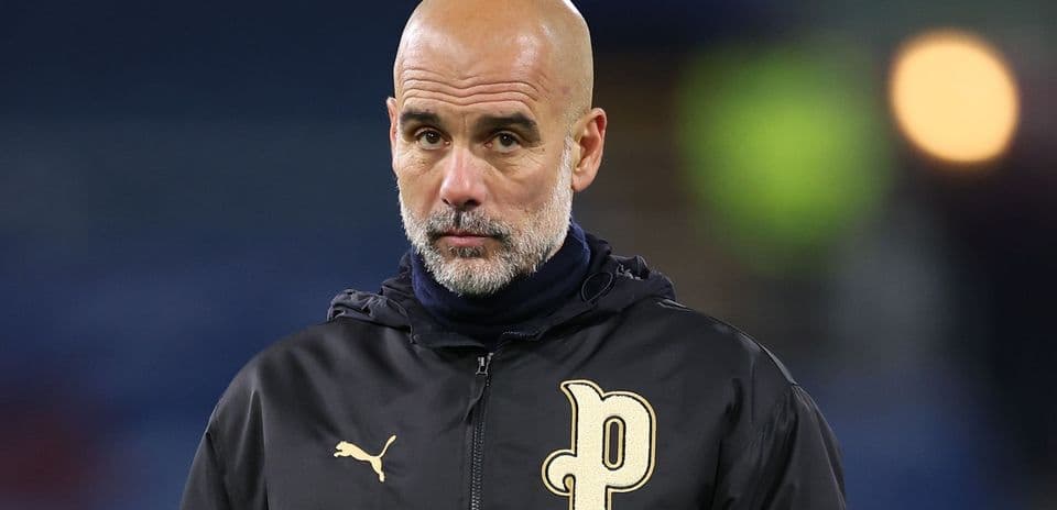 Coach standing on the sidelines during a match