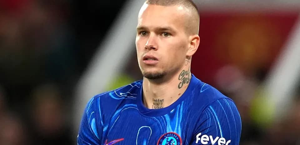 Player in Chelsea kit during match action