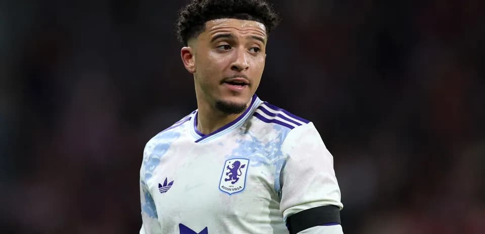 Aston Villa player in white kit during match