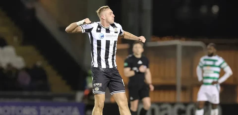 Player celebrating a goal on the field