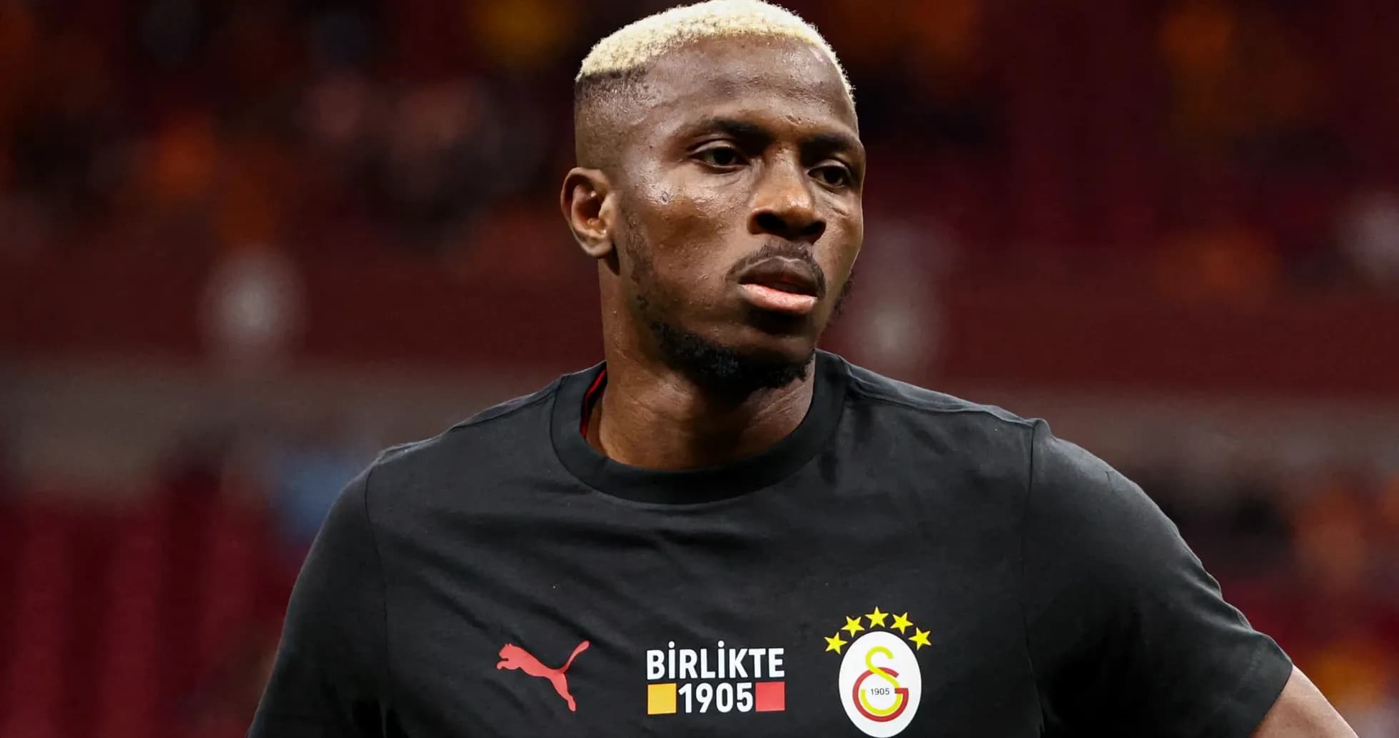 Player in Galatasaray jersey during warm-up