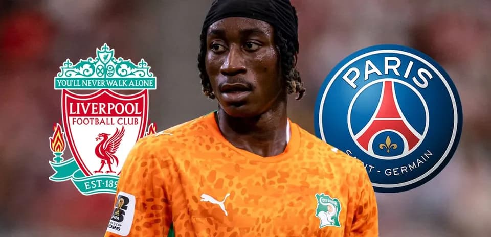 Player in orange jersey with Liverpool and PSG logos