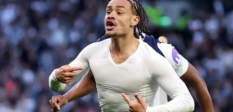 Player celebrating a goal with pointed gestures