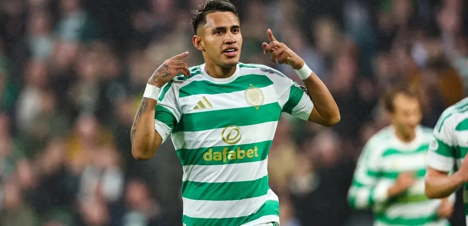 Player celebrating a goal in Celtic kit