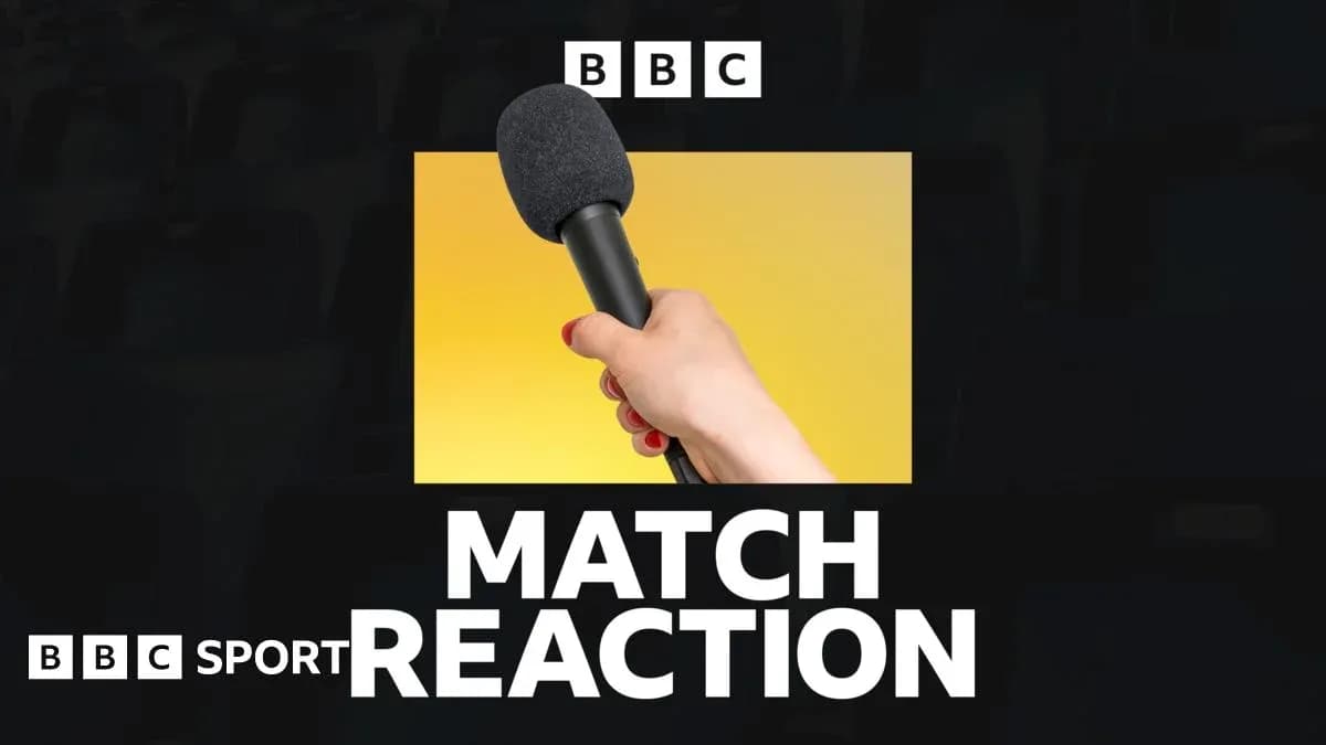 Hand holding a microphone with match reaction text