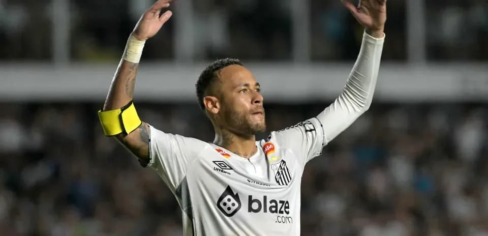 Player celebrating in Santos FC jersey during match