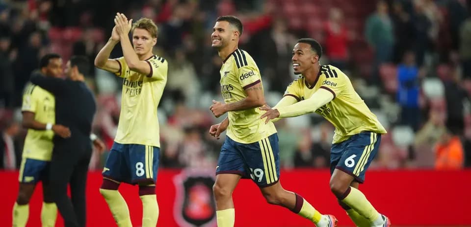 Players celebrating after a match victory