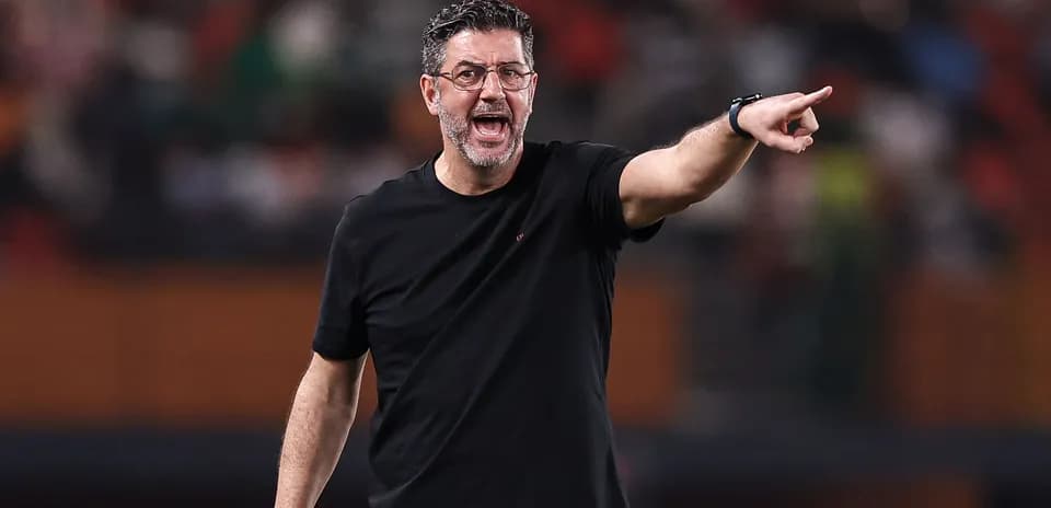 Coach giving instructions during a match