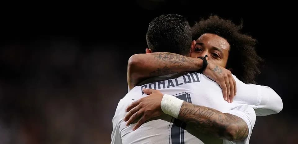 Cristiano Ronaldo and Marcelo celebrating an embrace