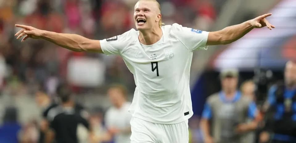Player celebrating after scoring a goal in match