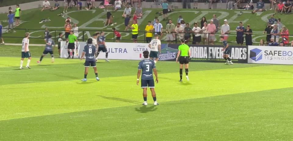 Players on field during Naples vs Sarasota match