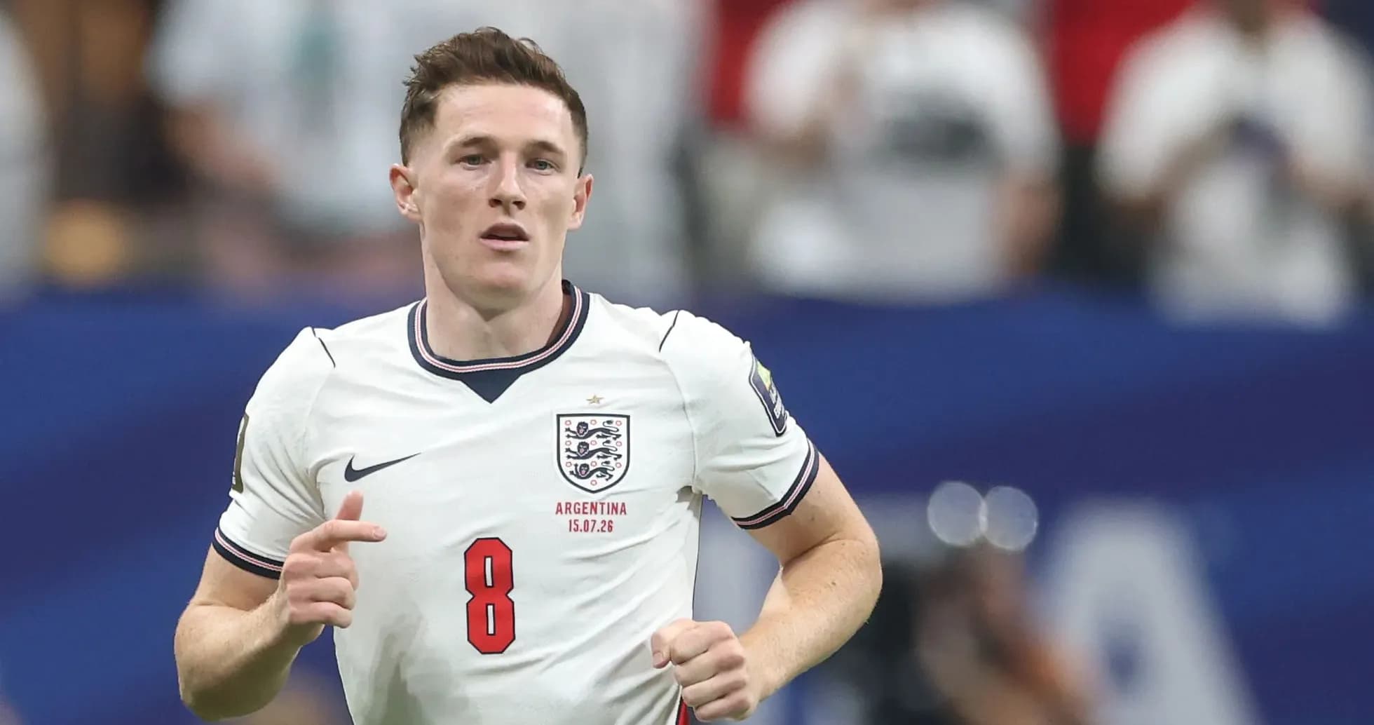 Player in England kit running during match