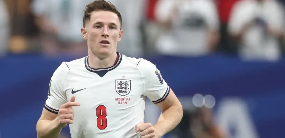 Player in England kit running during match