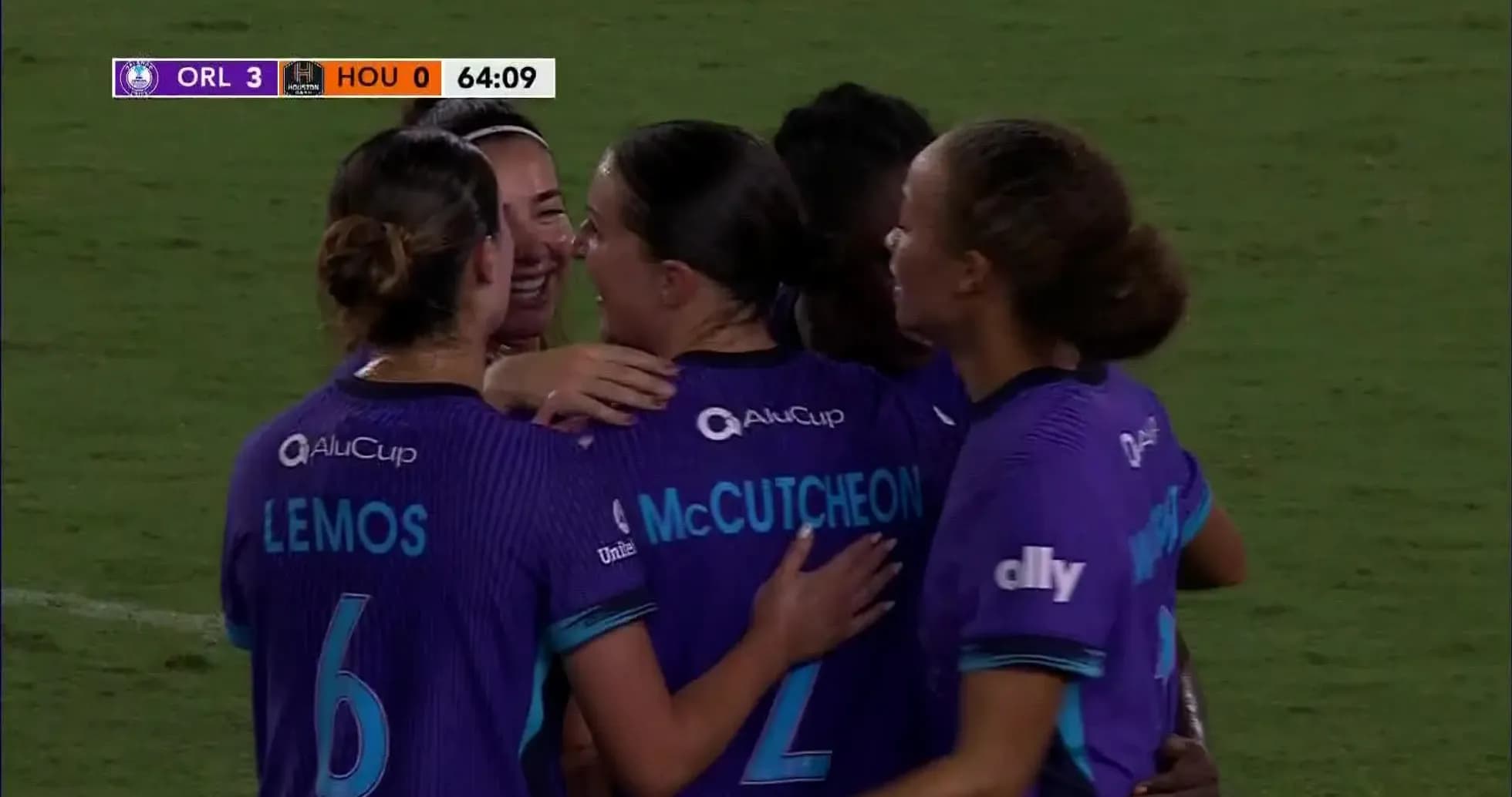 Orlando Pride celebrating a goal against Houston Dash