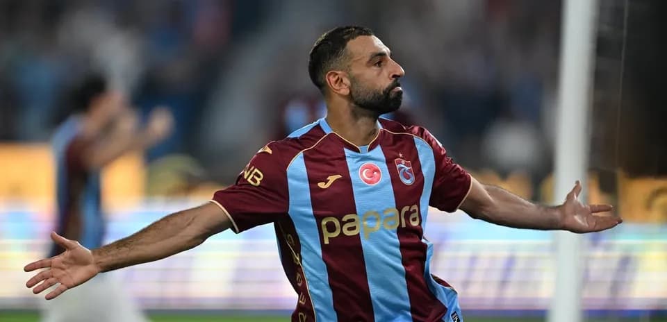 Player celebrating a goal with outstretched arms