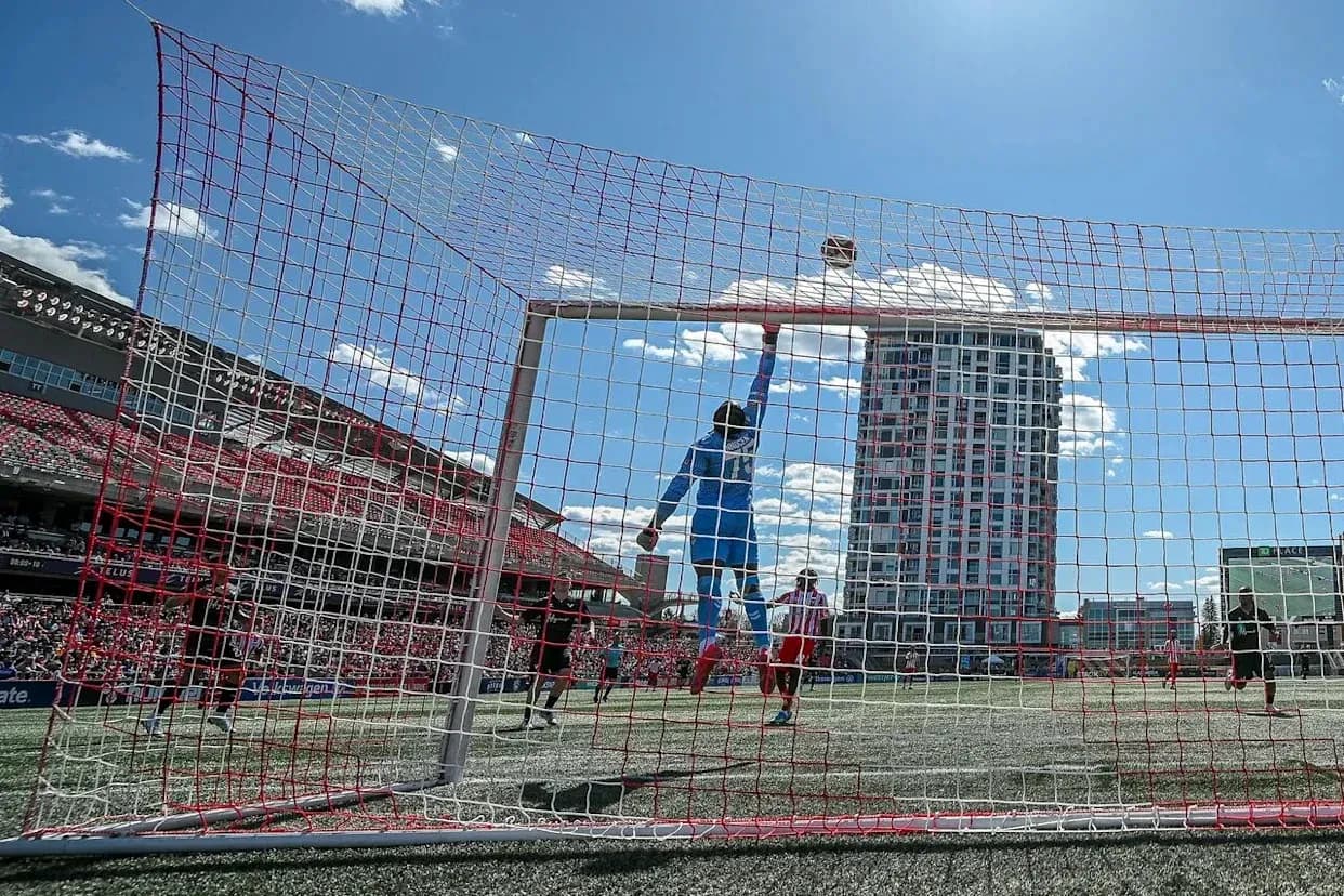 Goalkeeper making a save during match