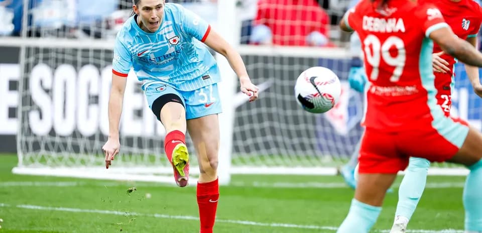 Player kicking the ball during Chicago Red Stars match