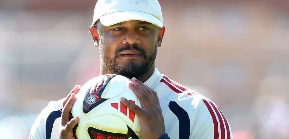 Player holding a soccer ball during training session