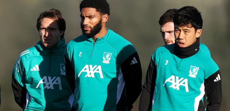 Players in Liverpool training gear at practice session
