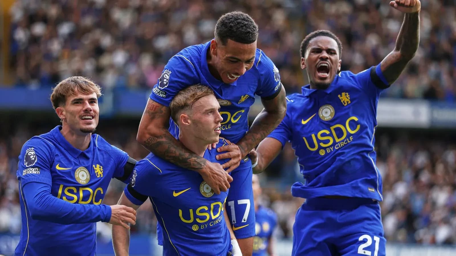 Chelsea players celebrating a goal during match