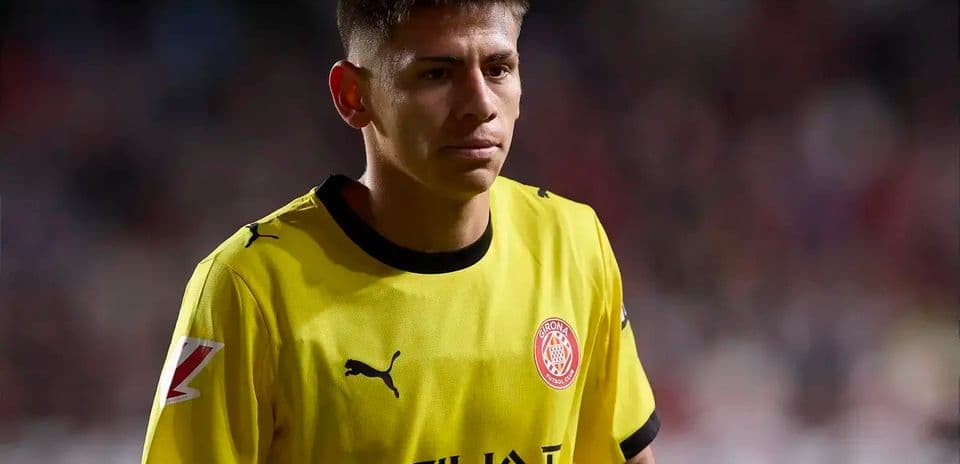 Player in yellow jersey walking on the field
